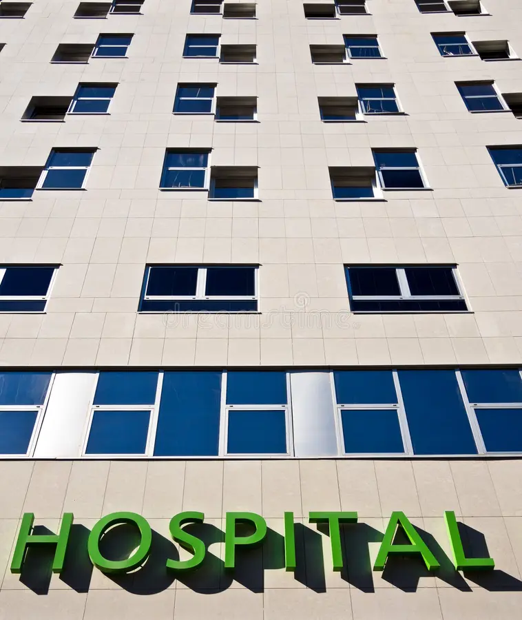 modern hospital building sign green above entrance 30098450